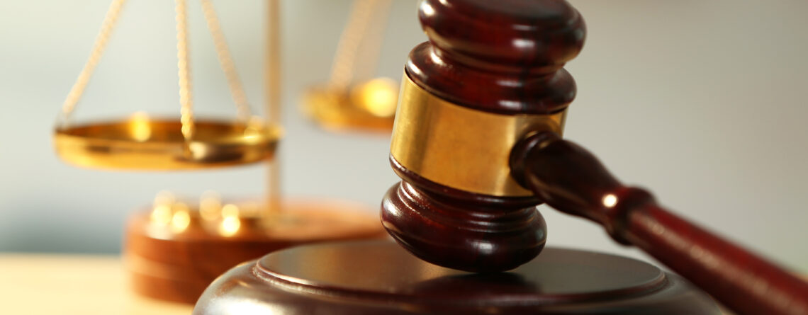 Gavel on wooden table