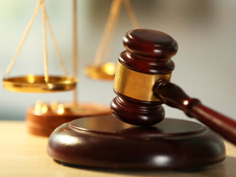 Gavel on wooden table
